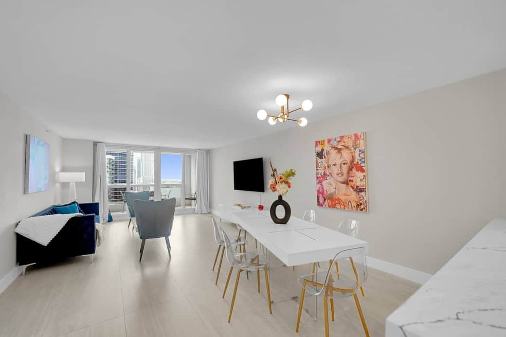 Dining area, living area with Roku streaming tv, balcony access, water views Dining area, living area with Roku streaming tv, balcony access, water views