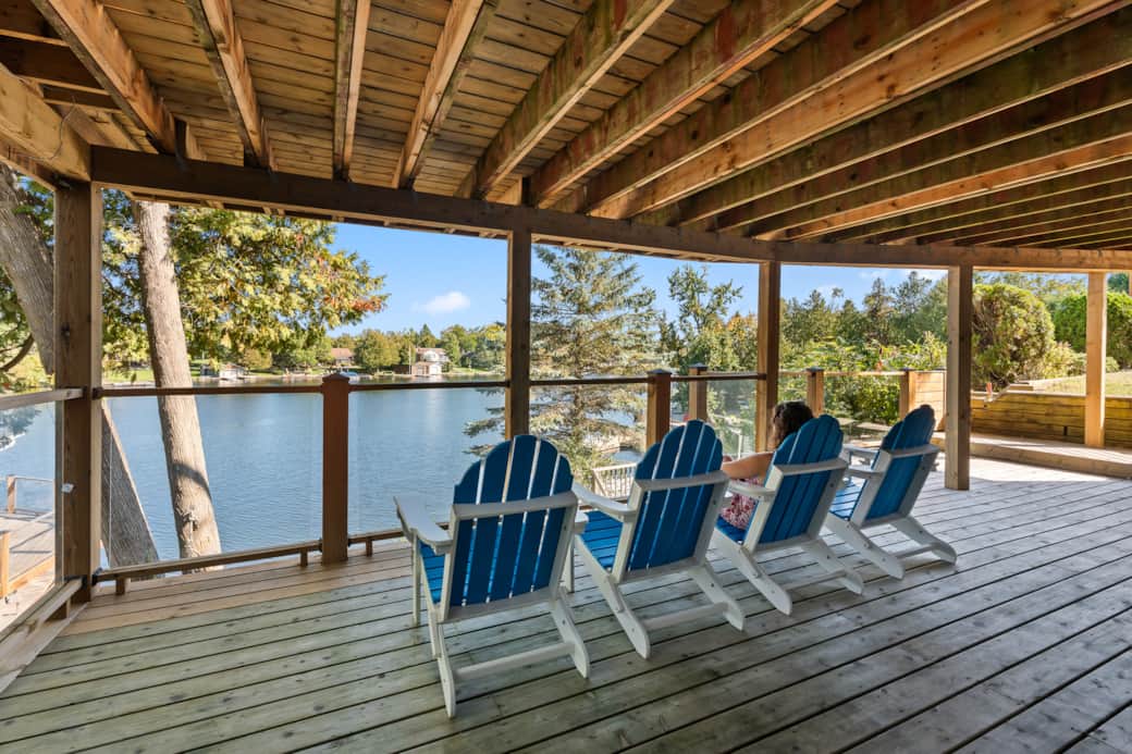 Waterfront lounge deck with shade