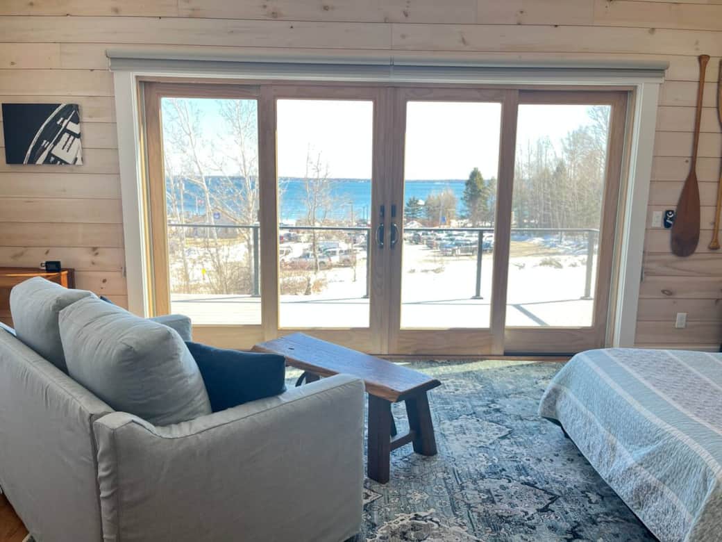Relax on a plush sofa, enjoy bay views, and unwind on your deck in this rustic Lincolnville escape.