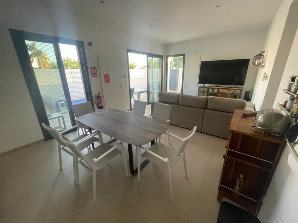 Open dining area with a large table for shared meals