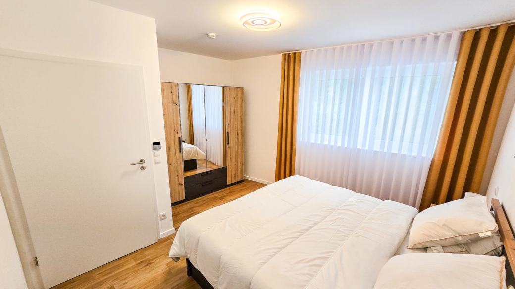 Frensdorf apartments a1 schlafzimmer doppelbett 01