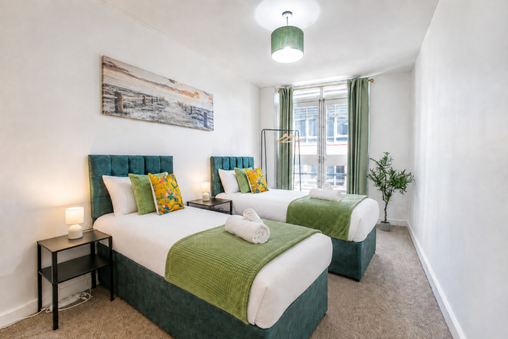 Bedroom two with 2x single bed