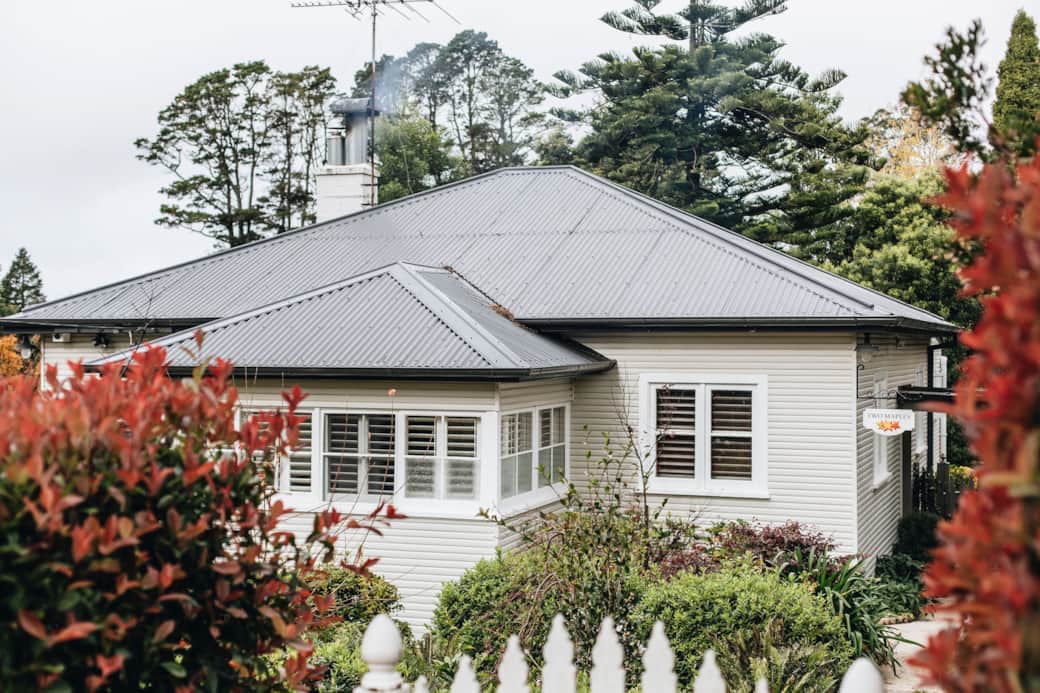 The classic 1942 mountains cottage is set amongst a cold climate garden