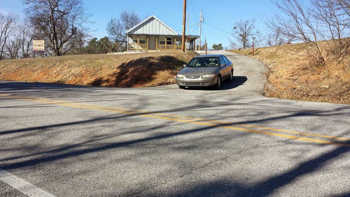 Blanchard Caverns Cabin & 31 Acres on Scenic Hwy 14 viewing from Scenic Hwy 14 entrance