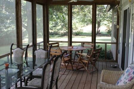 Screened in porch before swing