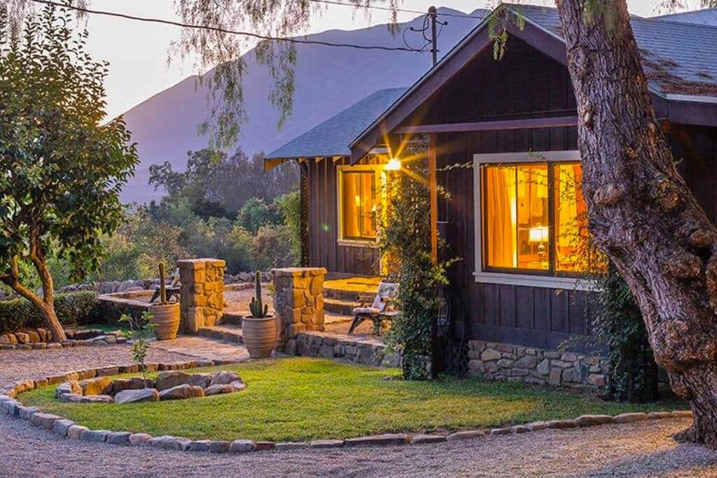 Home at dusk with view of pink moment @casaAwayOjai Home at dusk with view of pink moment @casaAwayOjai