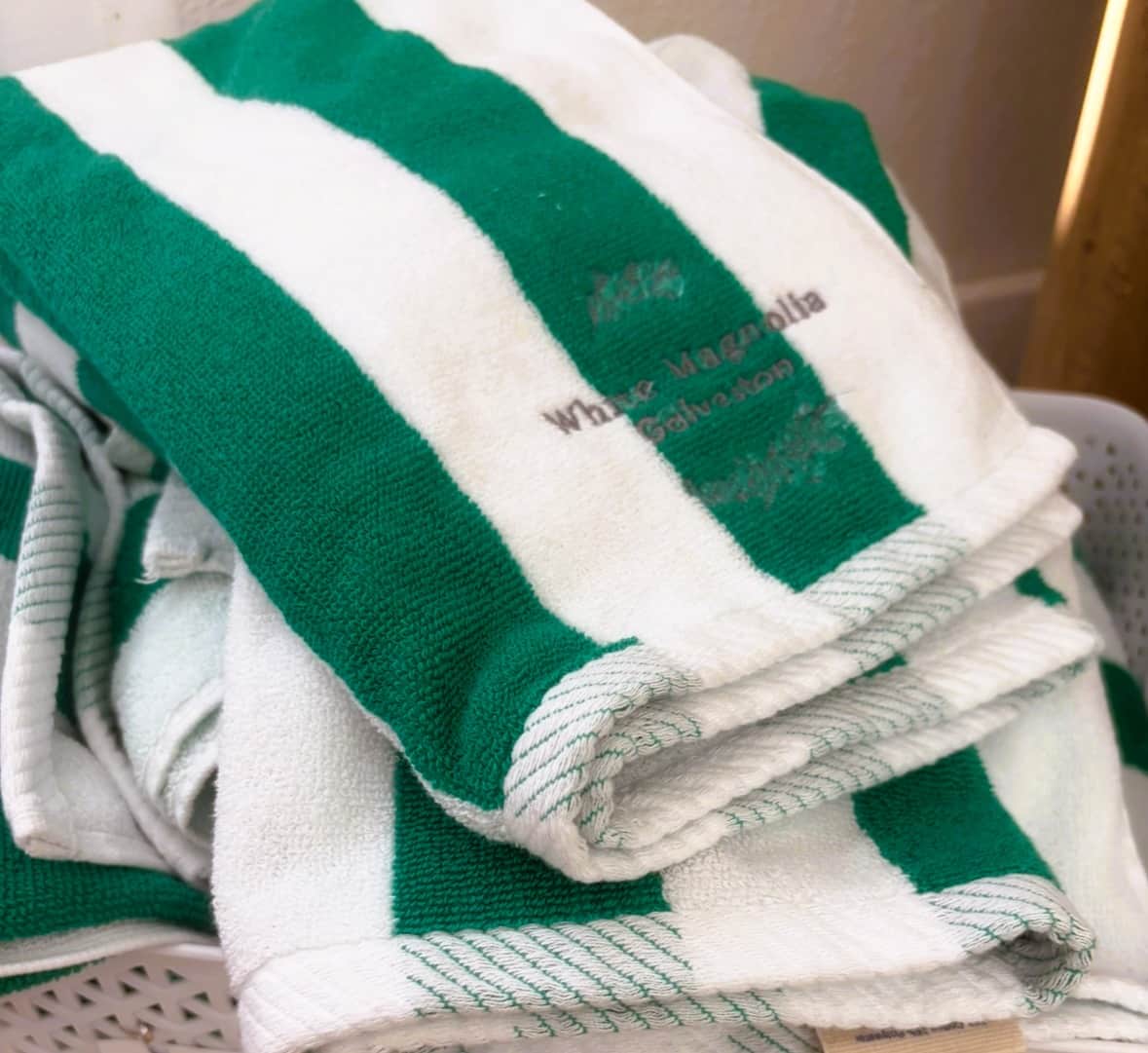 Beach towels provided for guests at White Magnolia Galveston for Seawall and beach days