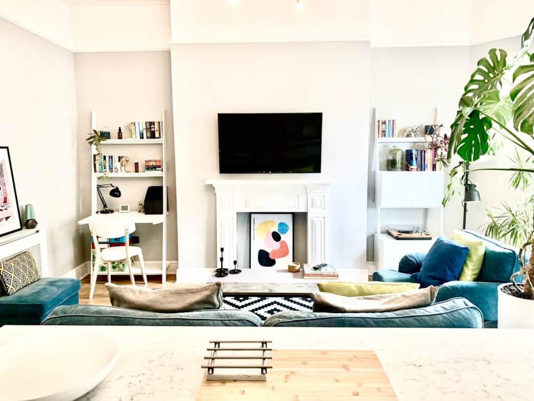 Living Room: The open-plan kitchen/living area is bathed in natural light