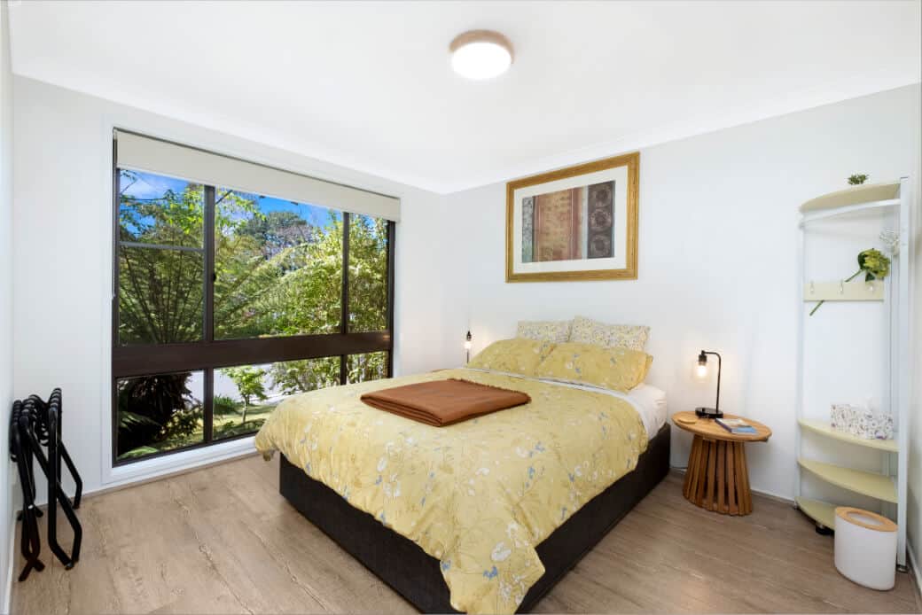 Bedroom #2 features queen sized bed and views onto the front garden. All rooms have luggage racks.