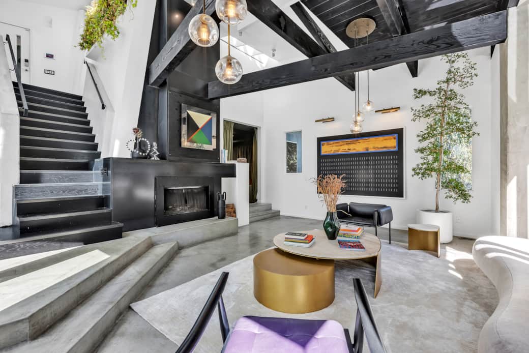 Relax in our living room, where elegant design meets comfort in a bright, airy space.