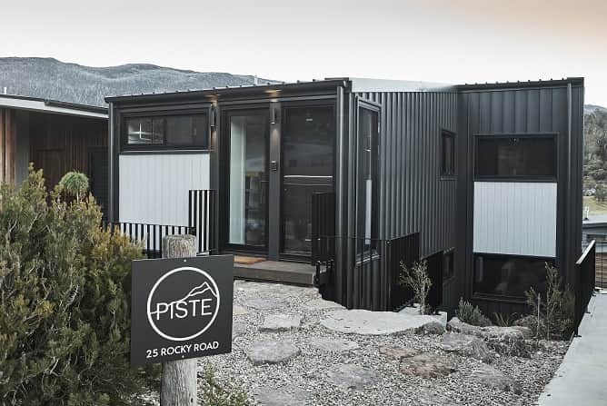 Nestled high on the hill, the Chalet's modern architectural design fits with the native landscape.