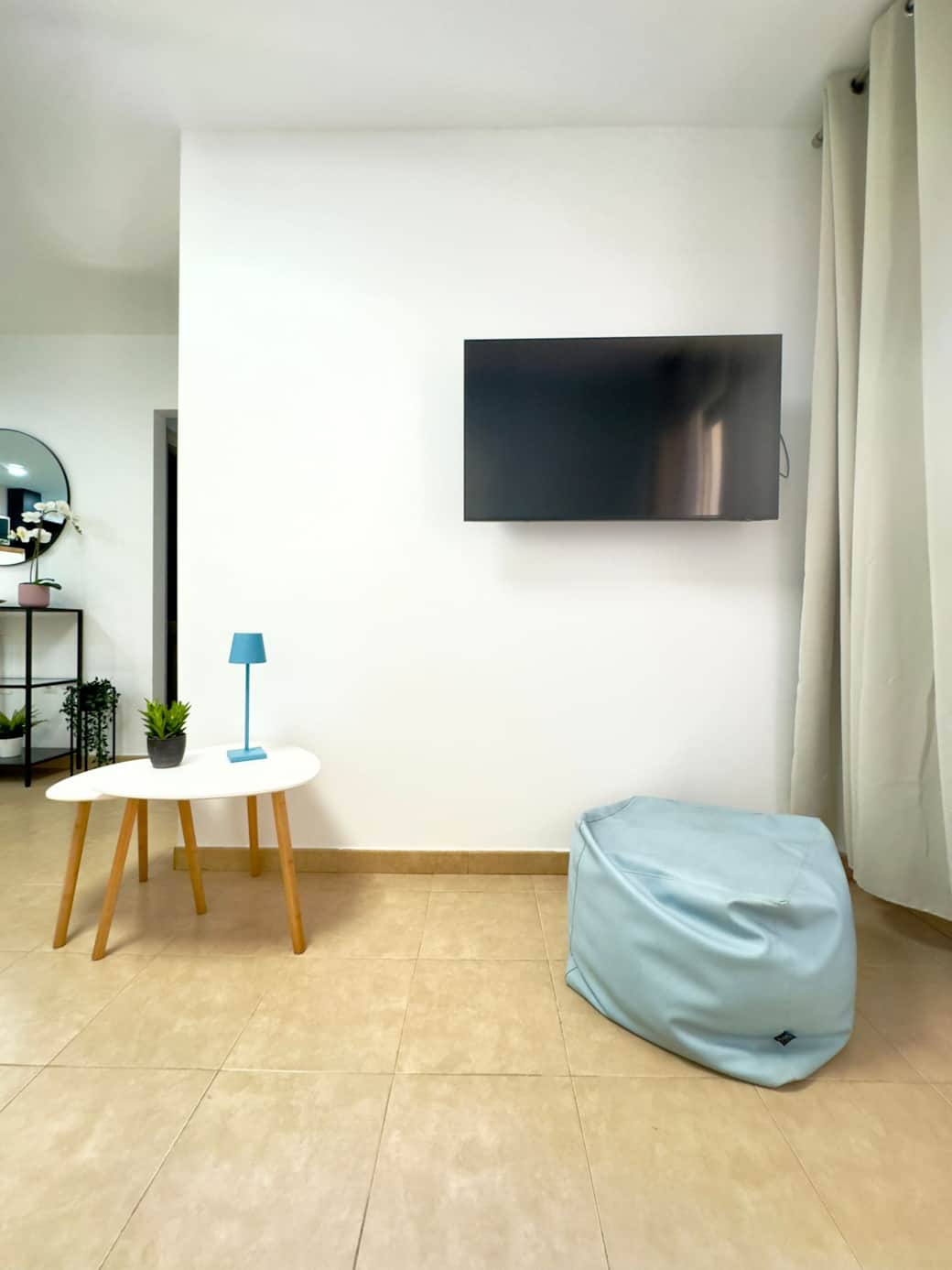 Flat-screen TV in living area for entertainment and downtime.