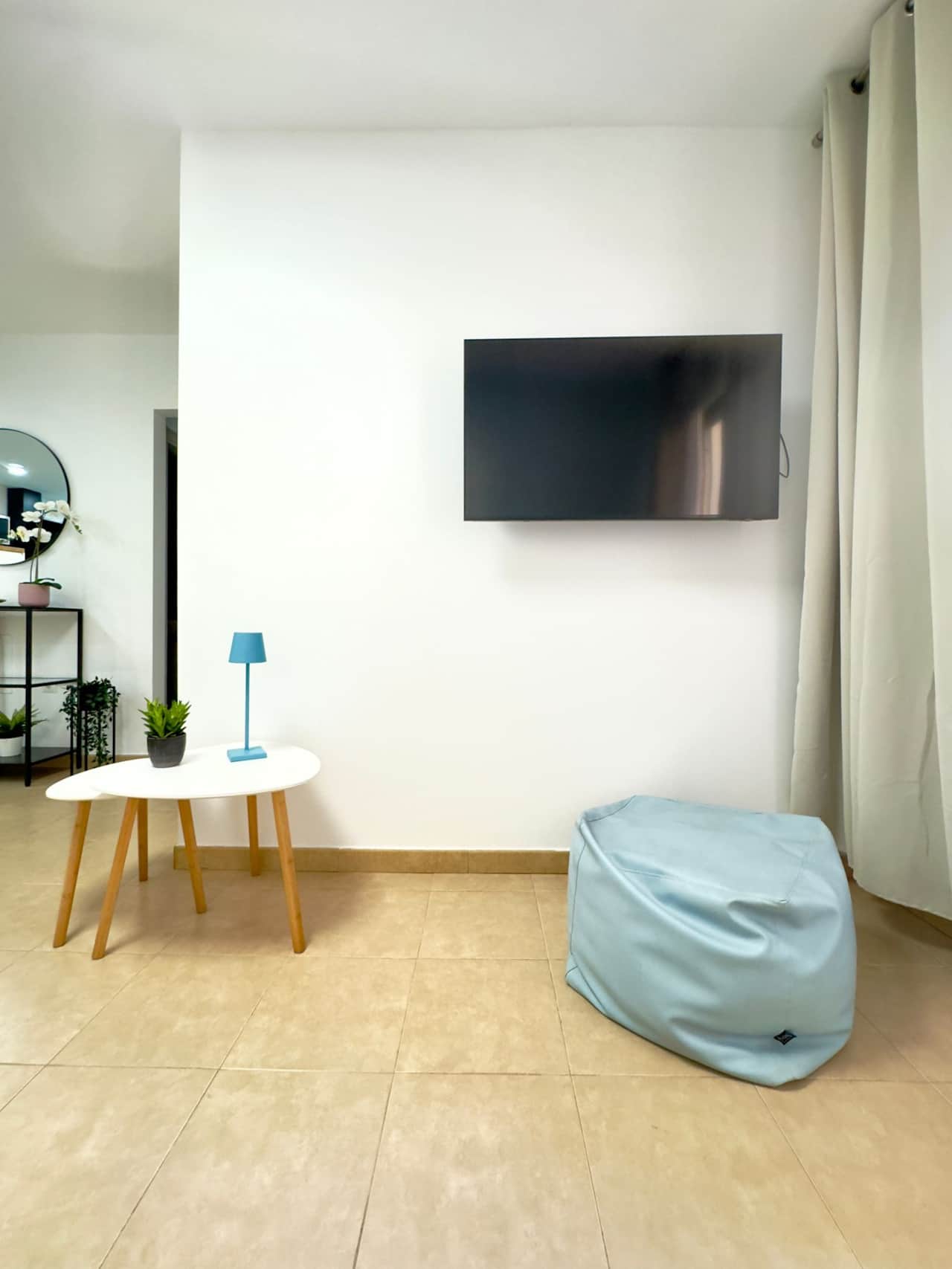 Flat-screen TV in living area for entertainment and downtime.