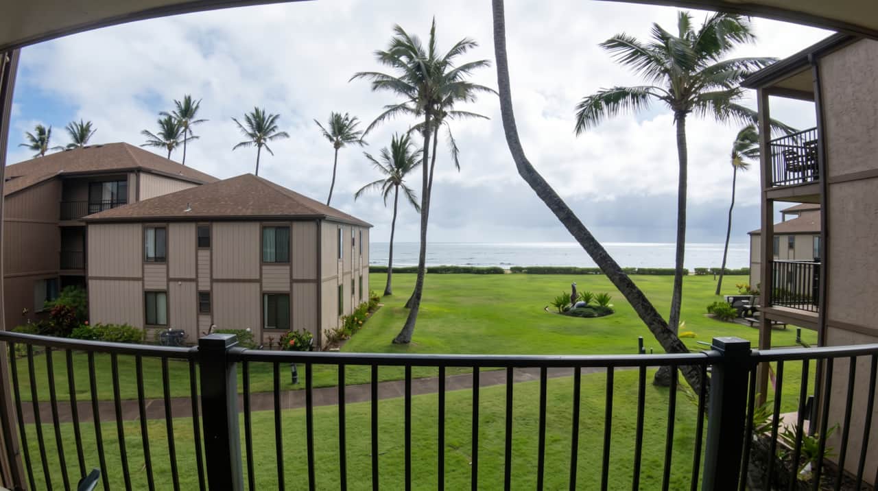 Enjoy tropical grounds, swaying palms, and ocean views from the private lanai.