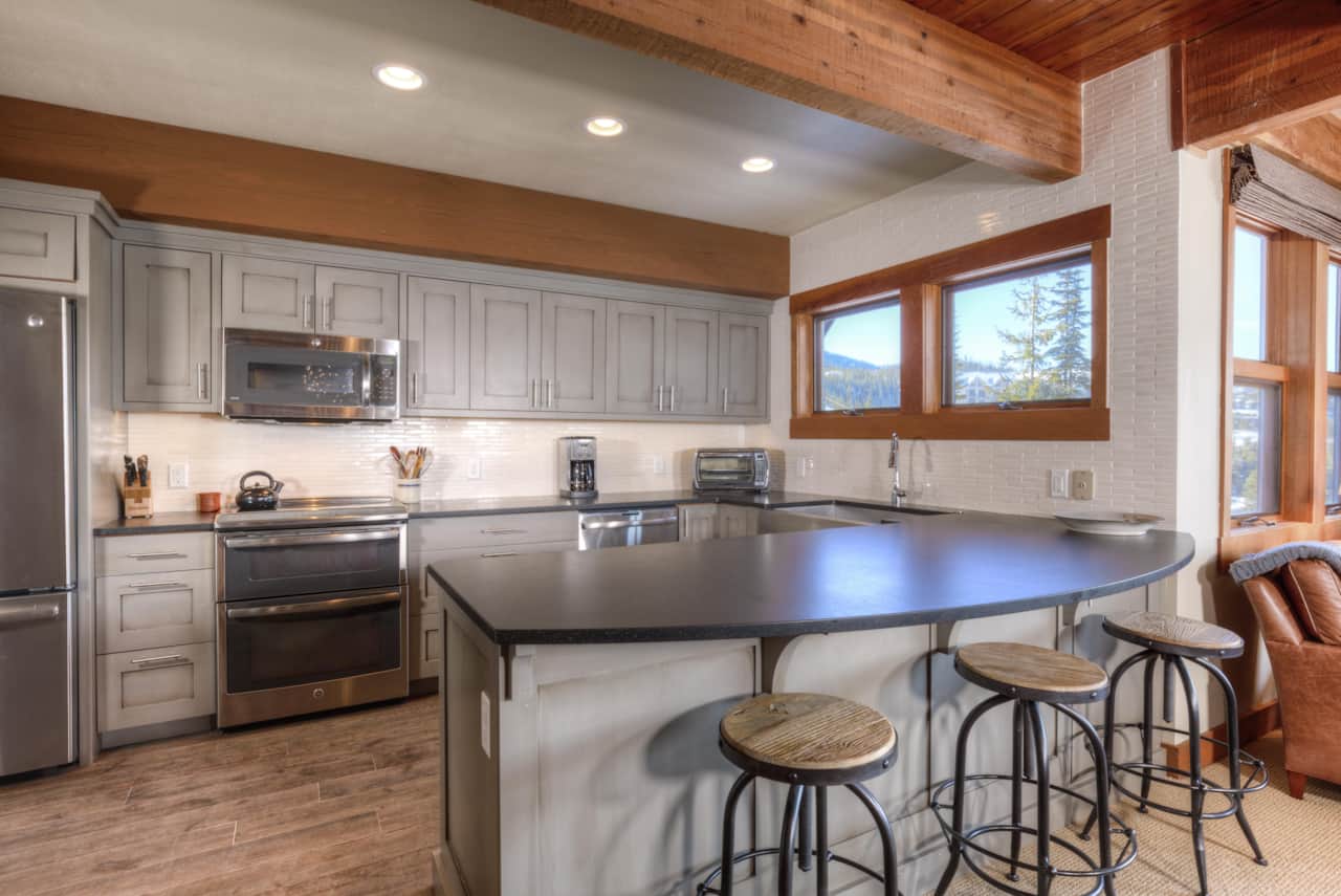 Family friendly big sky vacation home kitchen island area 