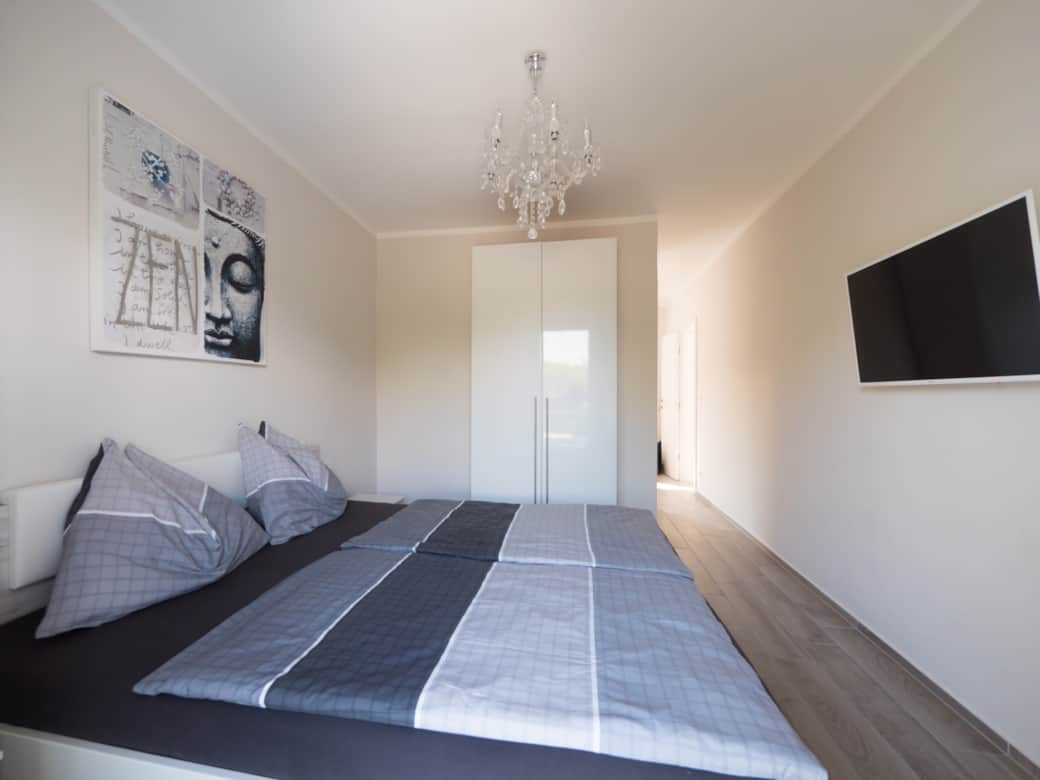 Bett- Apartment 2 OG
