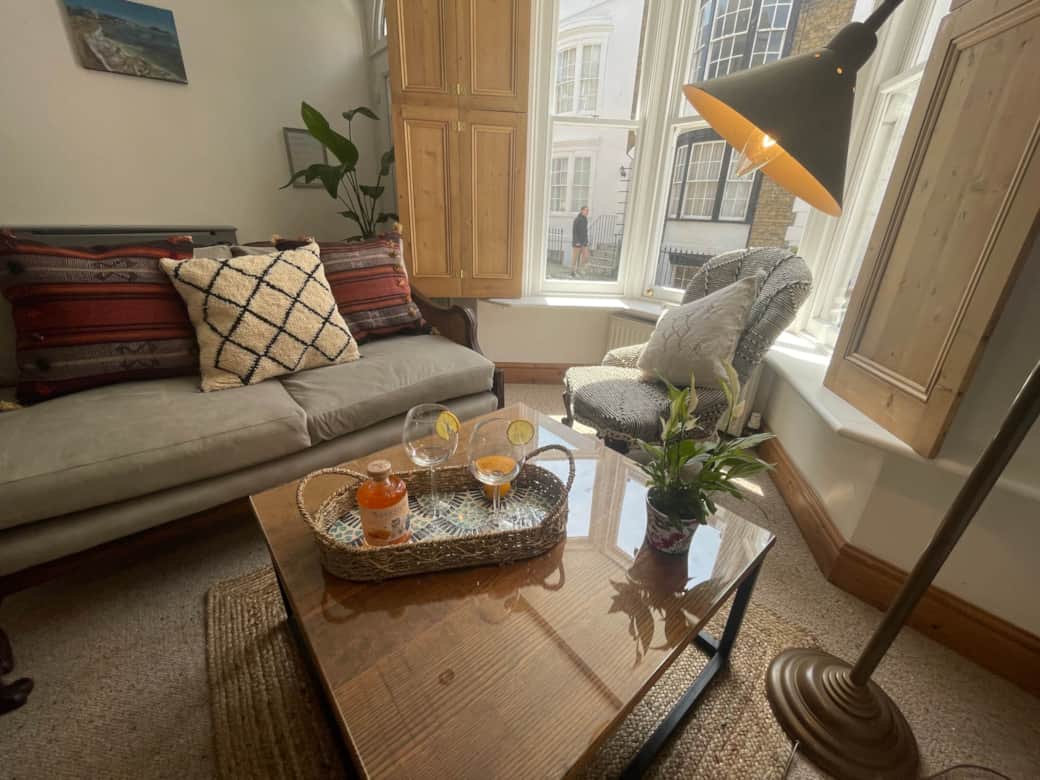 Plantation style interior design with Beni Ourain cushions