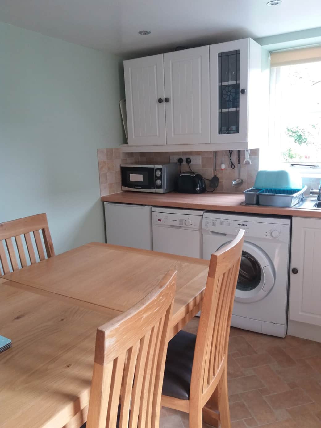 This Is the kitchen,It contains ..
Washing machine, dishwasher, cooker
and Fridge with small freezer ..
(commonly called a larder fridge/
freezer)
