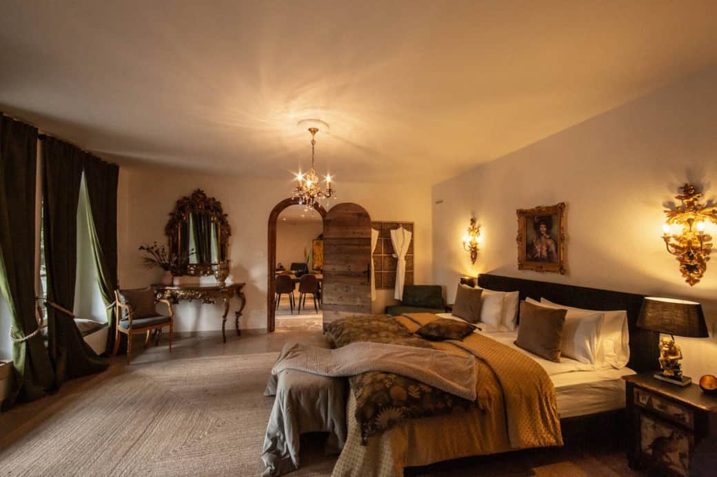 Spacious bedroom with king bed and adjoining living area