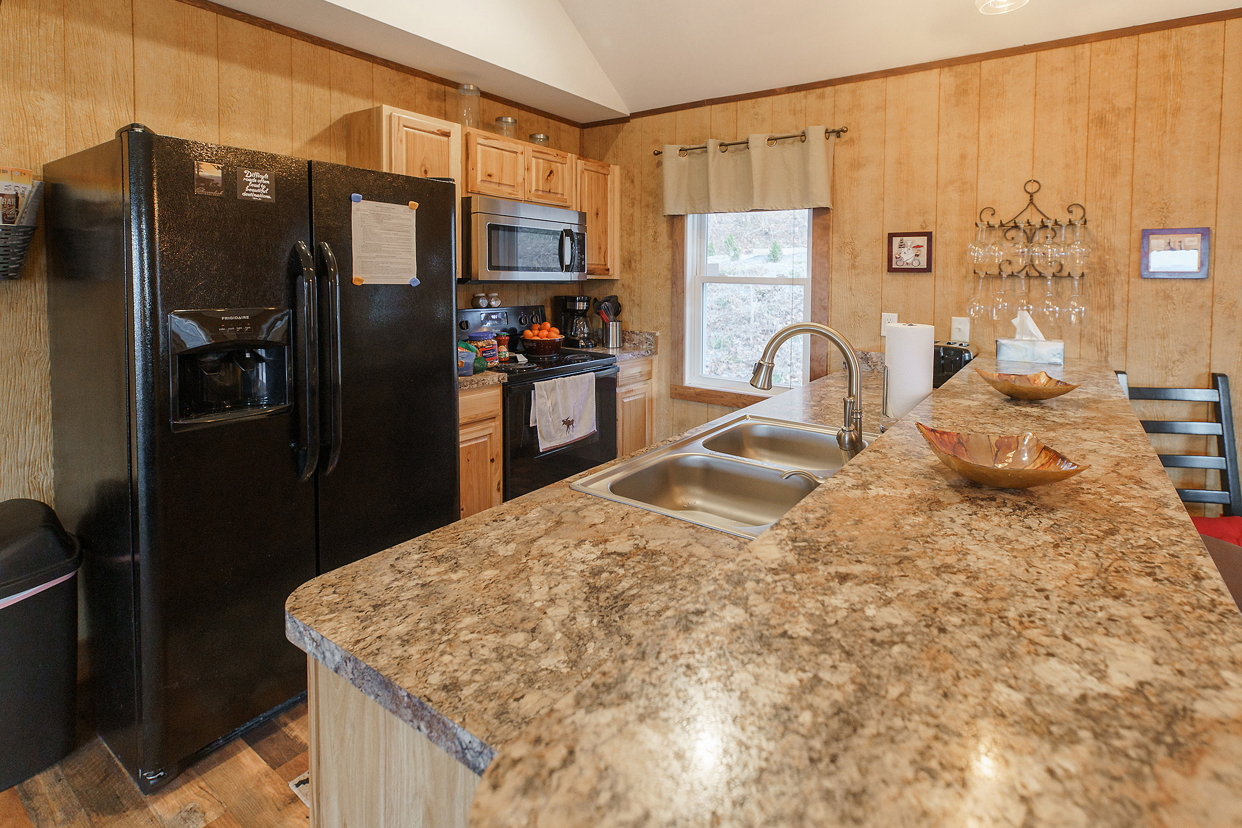Large Fridge and bar with barstools