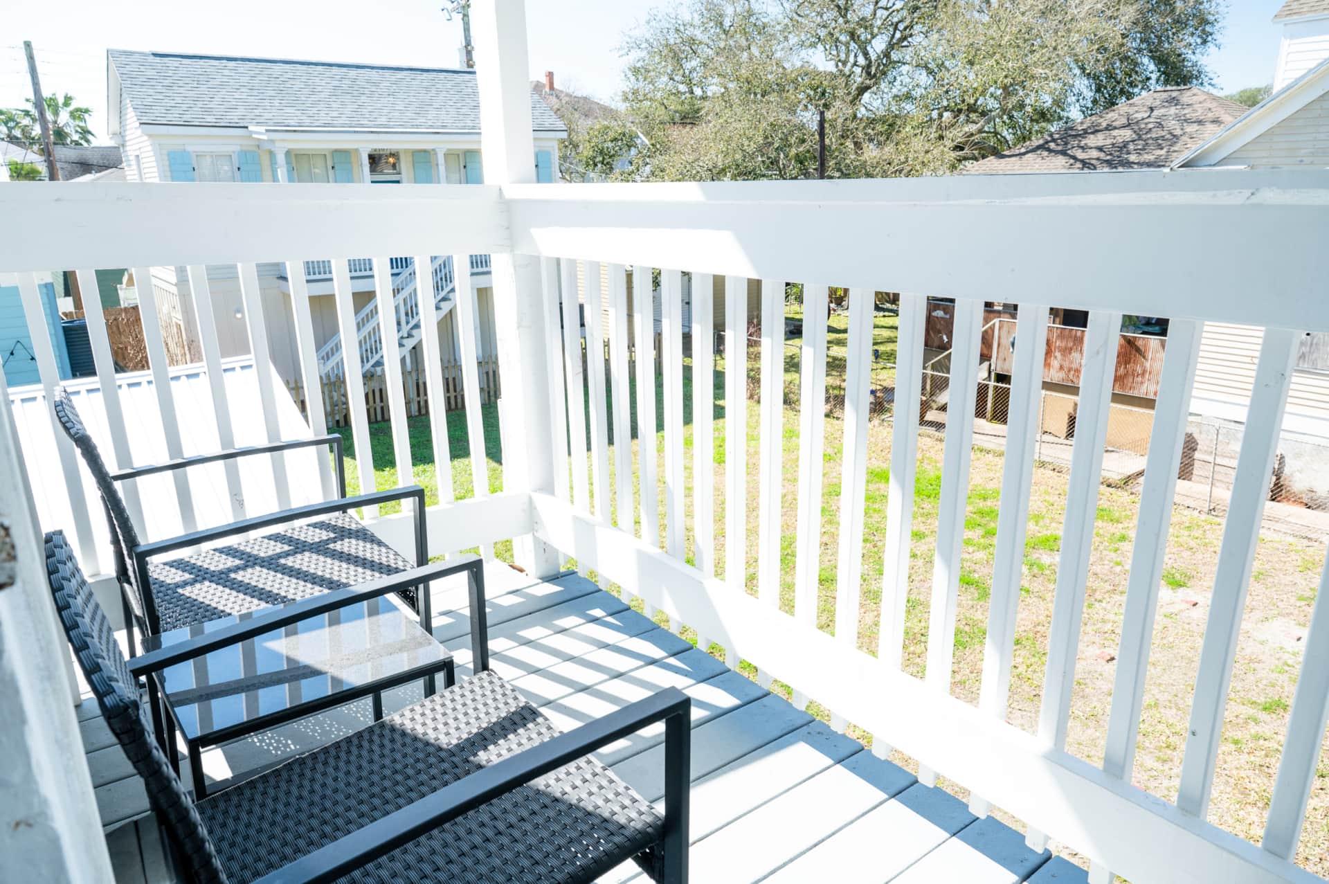 The primary bedroom has a private balcony for early morning coffee or late night conversations.