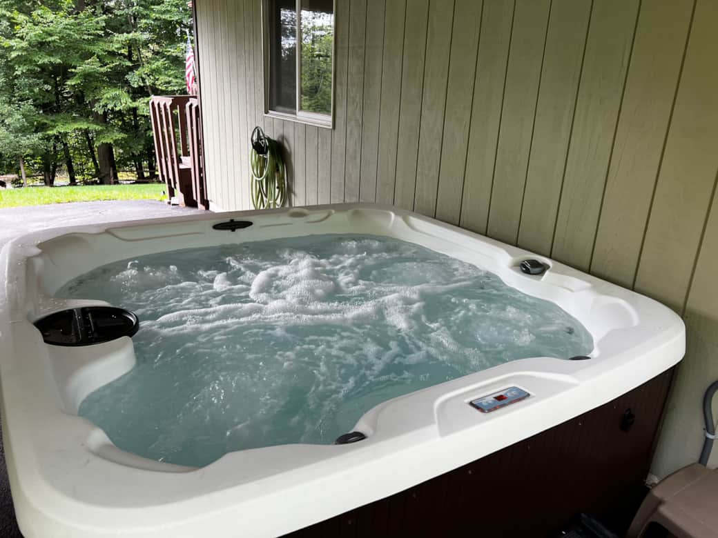 Covered hot tub for all weather enjoyment. Covered hot tub for all weather enjoyment.