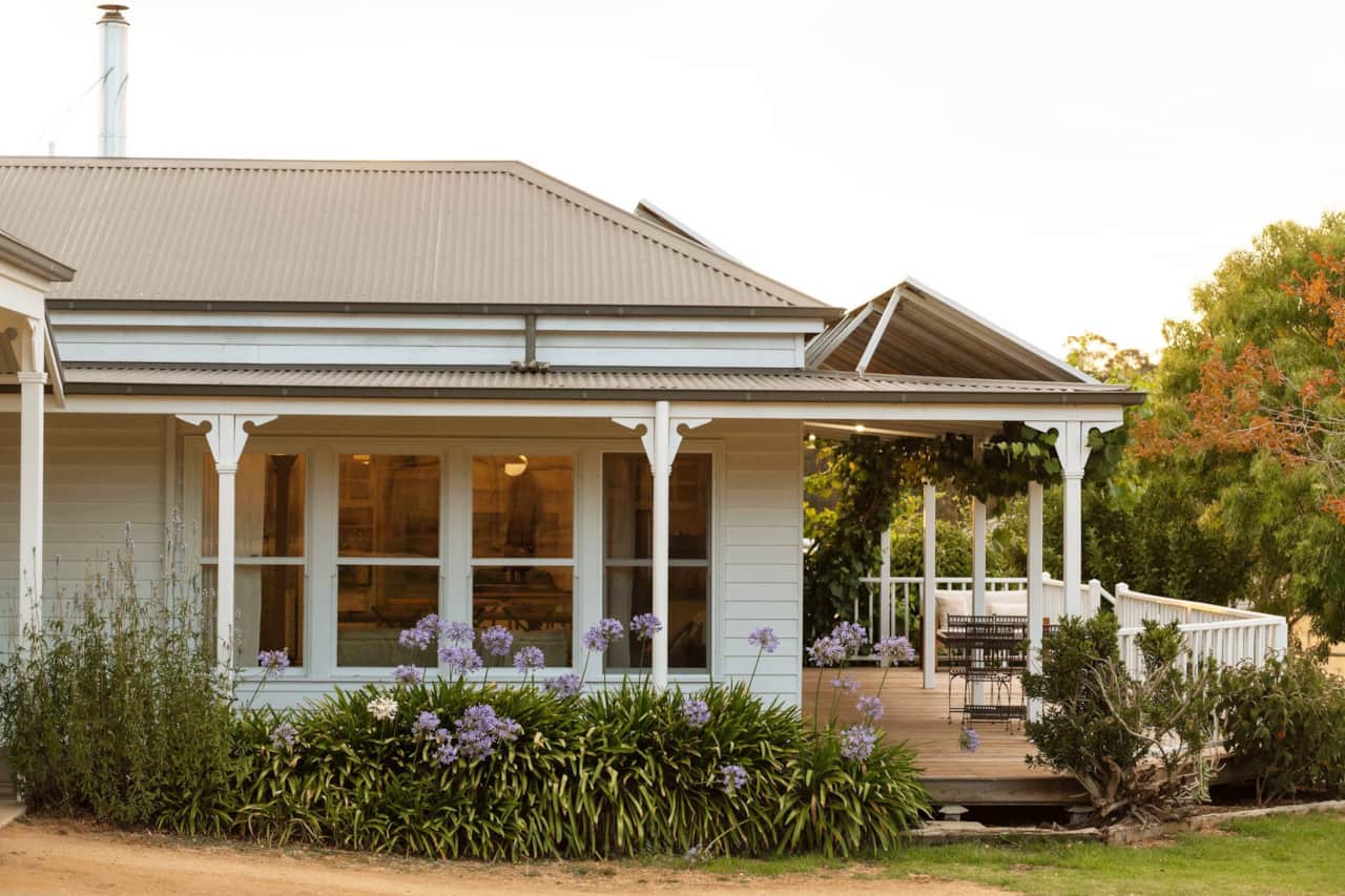 Dufflebird Farm wrap-around veranda and deck seating, Berrys Creek VIC, 120 acres beyond