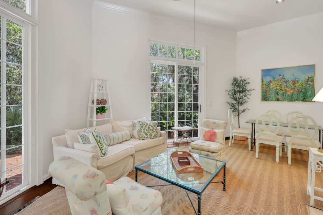 The Great Room has lots of cozy seating in the space, and easily flows into the Dining area. 