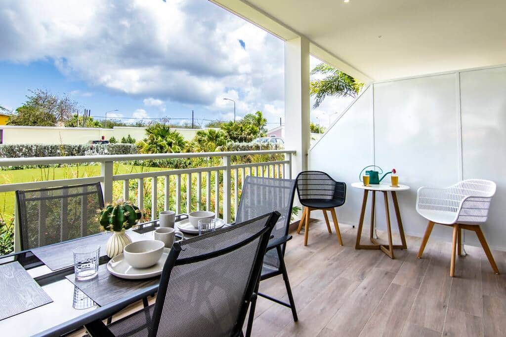 Terrace with garden furniture and sitting area.