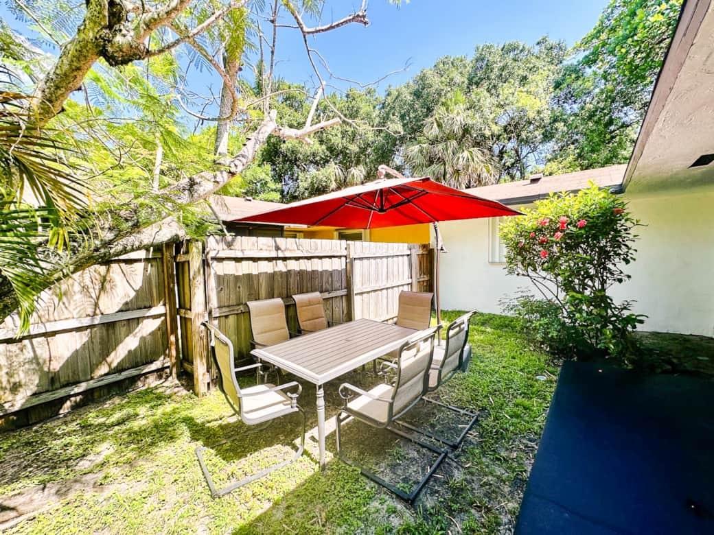 Backyard with Patio Furniture and Grill Backyard with Patio Furniture and Grill