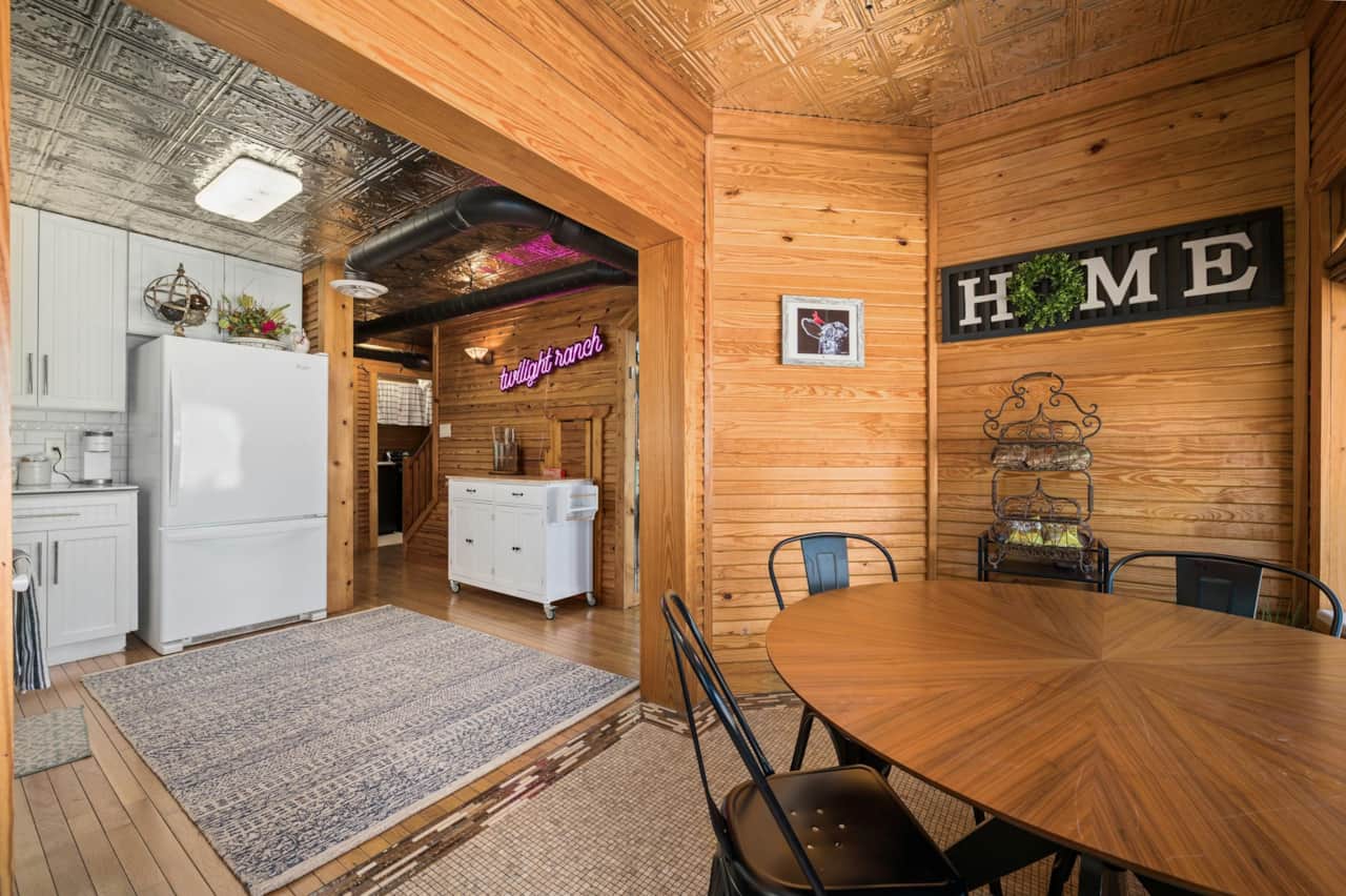 Dining Area: Bright wood tones and modern decor create the perfect spot for meals and memories!