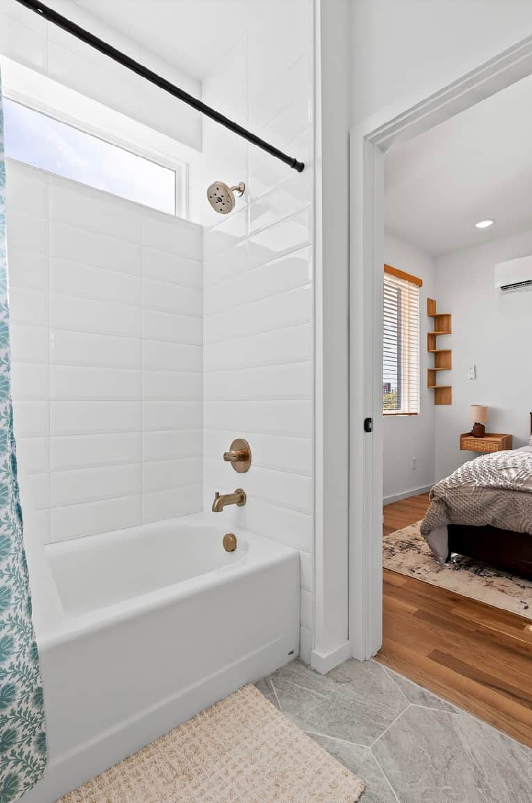 Shower in bathroom connected to Bedroom 2