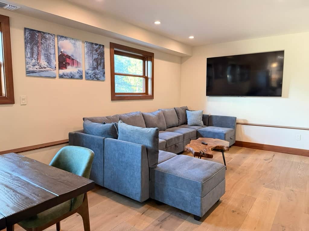 Spacious sectional seating in the main great room, perfect for large groups