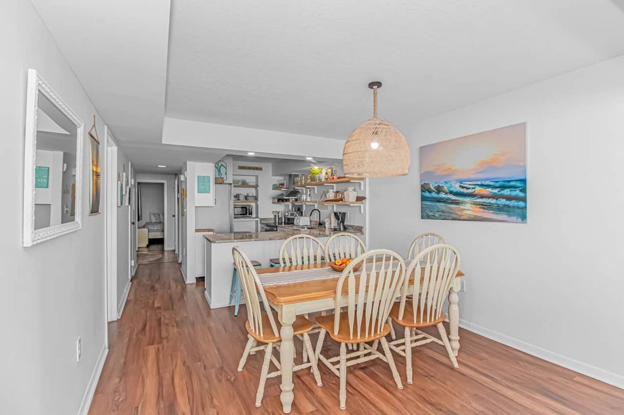 Spacious dining area just off the fully equipped kitchen — perfect for family meals and gathering together.