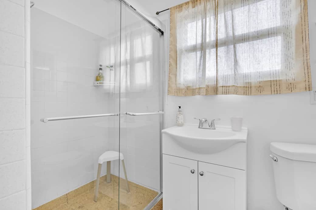 Upstairs shared bathroom with shower