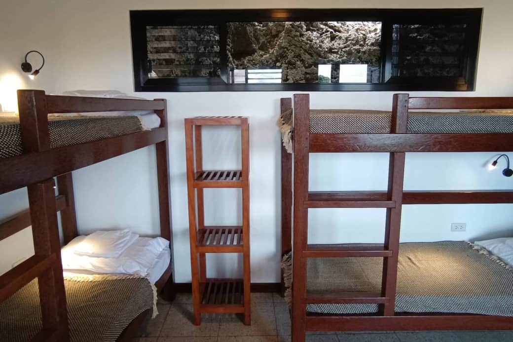 Lower level Room 2.  Opens up on the lower veranda with lounge area facing the ocean, jacuzzi and bathroom.   Sleeps 4 in two bunk beds.  Accessed via an exterior stairway.  Not suitable for PWD.  Lower level Room 2.  Opens up on the lower veranda with lounge area facing the ocean, jacuzzi and bathroom.   Sleeps 4 in two bunk beds.  Accessed via an exterior stairway.  Not suitable for PWD.