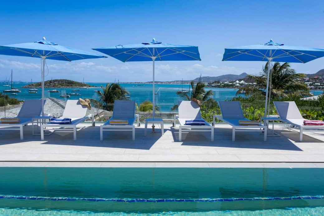 Pool with lounge chairs and a view Azur
