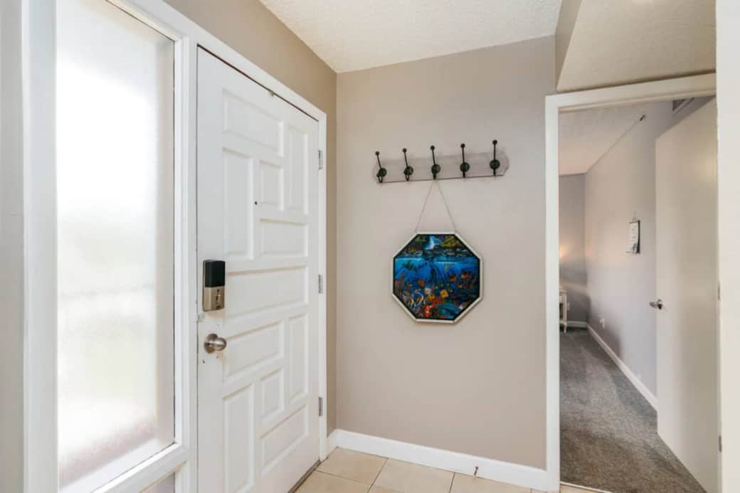 Dolphin Drive's front entry and hall closet and 2nd bedroom