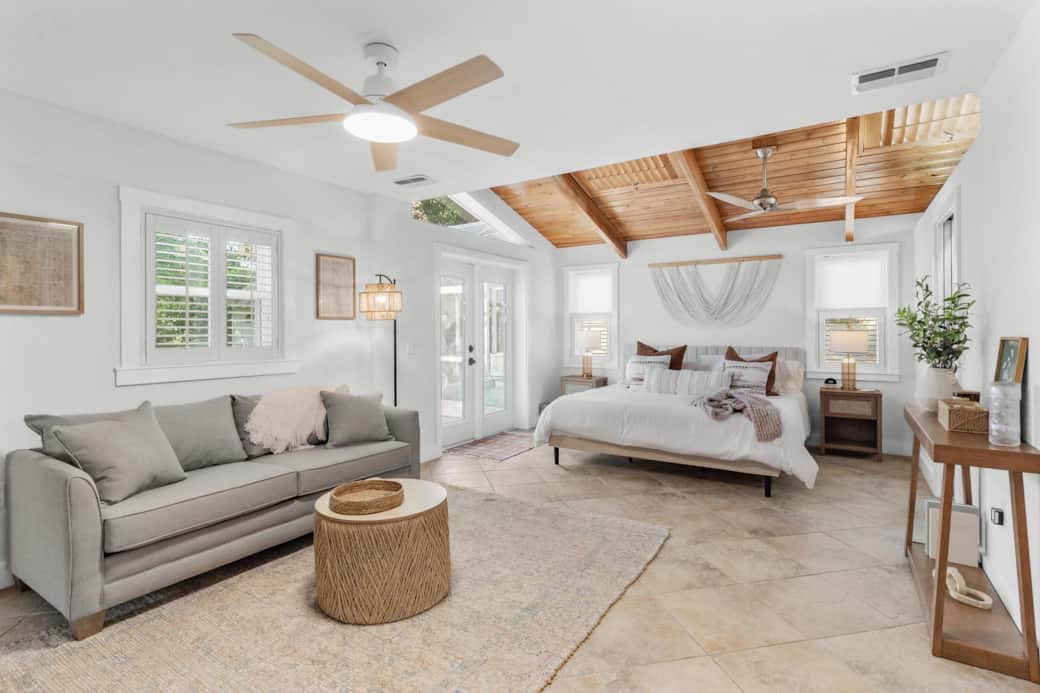 King bed next to outside access door and the pool entry. Queen sofa bed.