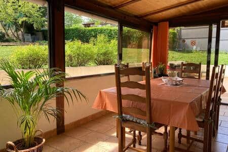 The veranda (south side) with its table for 6 people overlooking the garden