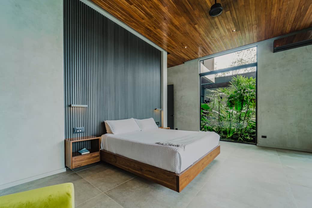 Wake up to jungle sounds and ocean views from the comfort of a king Tempur-Pedic bed