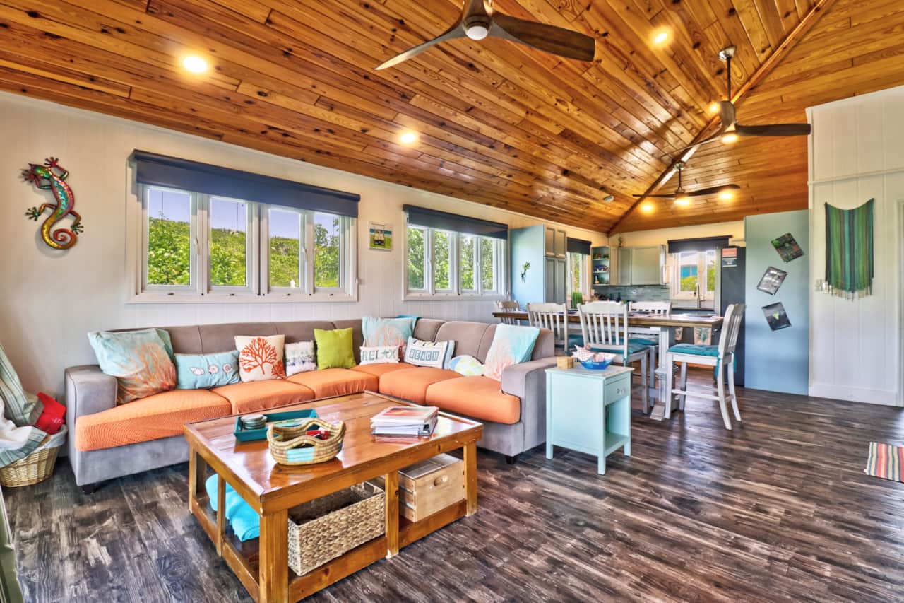 Our open floorplan living area flows from living room, to dinging coffee/wet bar to kitchen