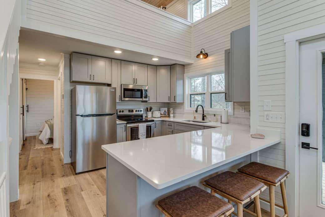 Kitchen with island and bar seating