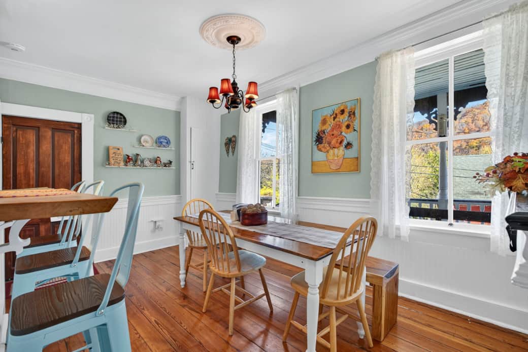 Kitchen with counter top bar and table