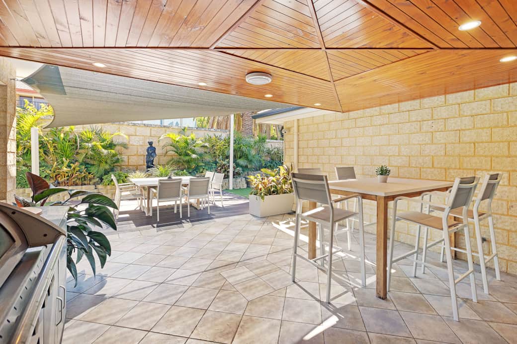 Enjoy the stylish entertaining area with BBQ, surrounded by lush tropical plants Enjoy the stylish entertaining area with BBQ, surrounded by lush tropical plants