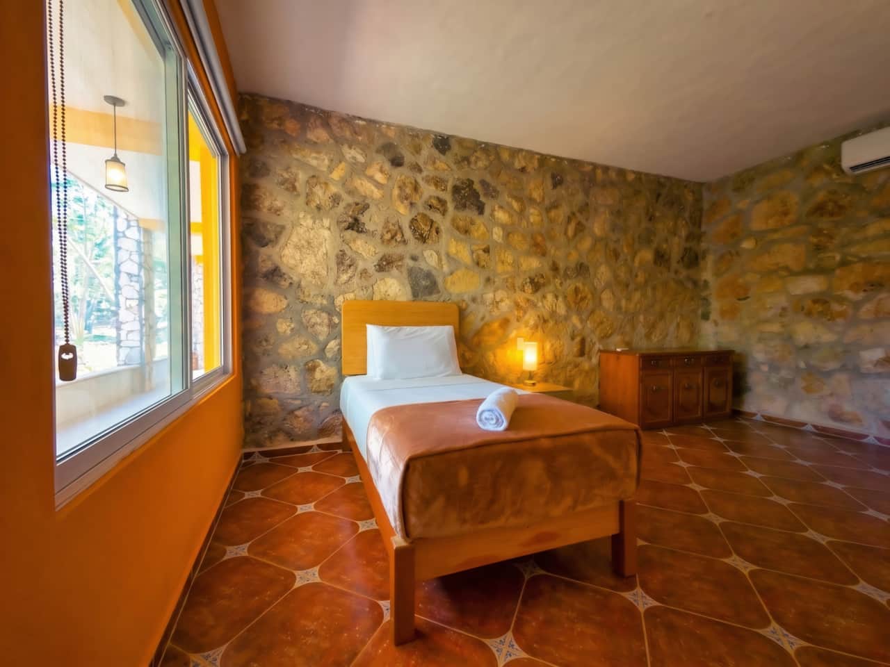 Room with single bed.