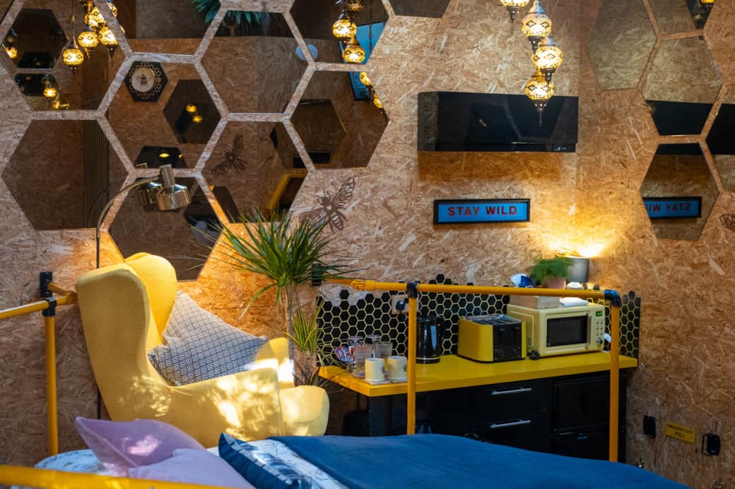 Small kitchenette with microwave, toaster, kettle and fridge 