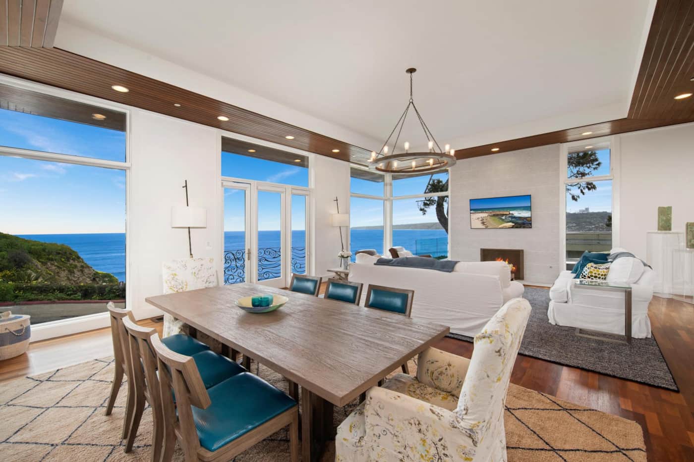 Ocean-view living and dining room at Casa de Costa Paseo La Jolla vacation rental