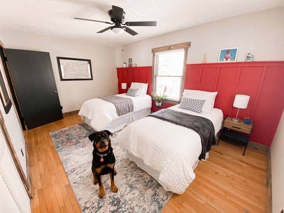 This bedroom provides two twin beds and a large closet for storage.