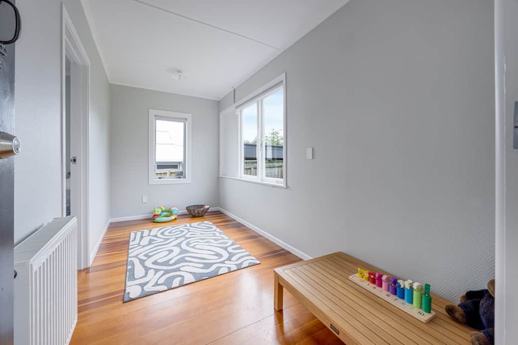 Sunny and safe kids playroom or hideout with access to the fully fenced backyard.